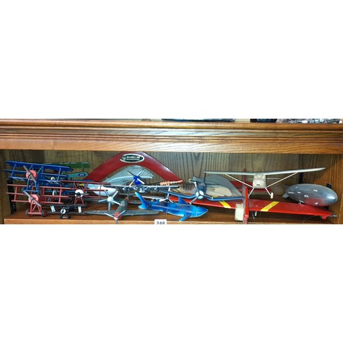 248 - SHELF OF MAINLY WWI MODELS OF GERMAN AND BRITISH BI PLANES AND ZEPPELIN