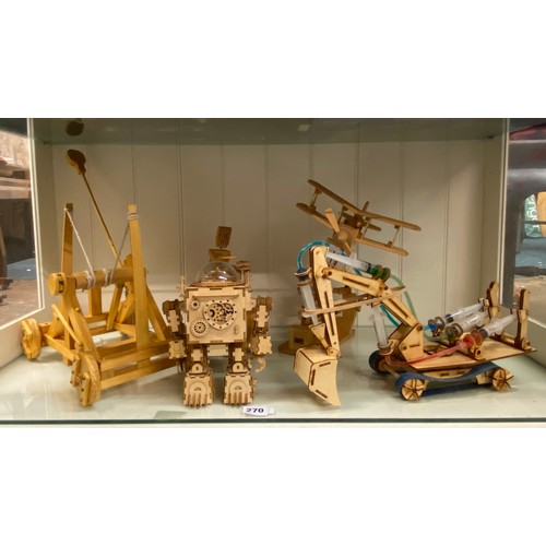 270 - BORN TO BUILD WOODEN MODELS OF A CRANE, ROBOT, CATAPULT, AND BI PLANE