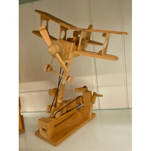 270 - BORN TO BUILD WOODEN MODELS OF A CRANE, ROBOT, CATAPULT, AND BI PLANE