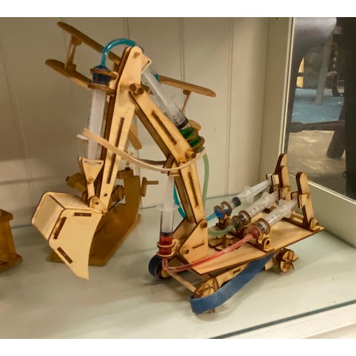 270 - BORN TO BUILD WOODEN MODELS OF A CRANE, ROBOT, CATAPULT, AND BI PLANE