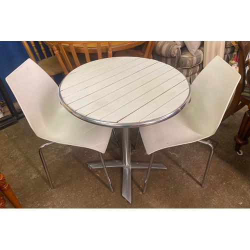 39 - CHROME WHITE PAINTED CIRCULAR TOPPED PEDESTAL PATIO/BISTRO TABLE WITH PAIR OF WHITE STACKING CHAIRS