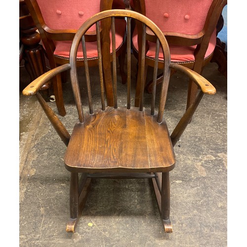 64 - ERCOL ELM SPINDLE BACK SMALL ROCKING CHAIR