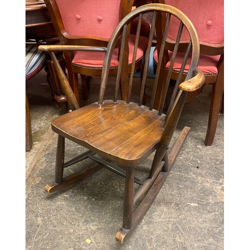 64 - ERCOL ELM SPINDLE BACK SMALL ROCKING CHAIR