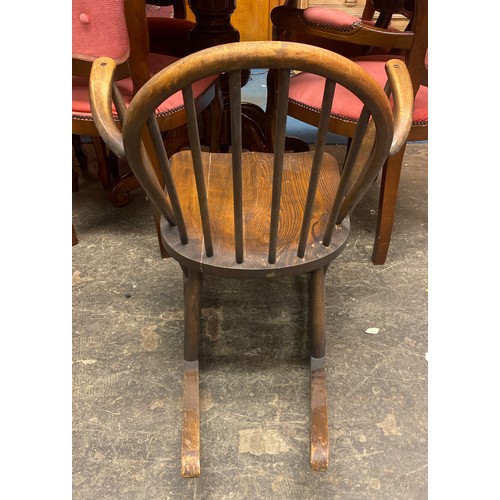 64 - ERCOL ELM SPINDLE BACK SMALL ROCKING CHAIR