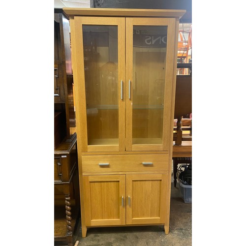 78 - MORRIS OAK GLAZED DISPLAY CUPBOARD