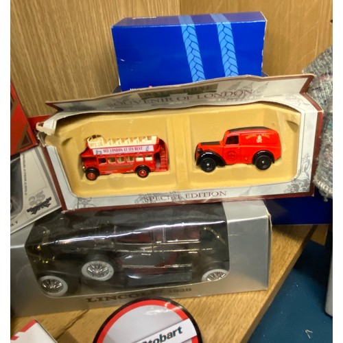 297 - BOXED DIECAST EDDIE STOBART HAULAGE WAGONS AND FLAT BED TRUCKS AND SOME OTHER BOXED DIE CAST CARS