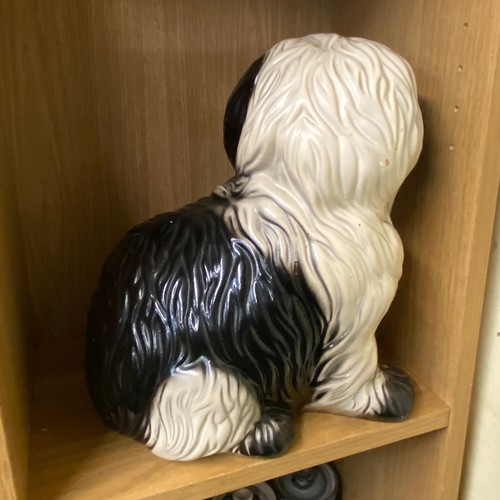 298 - POTTERY SEATED SHEEP DOG FIGURE