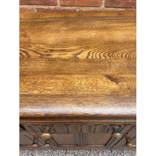 131 - ERCOL STYLE OAK LUNETTE CARVED DRESSER BASE