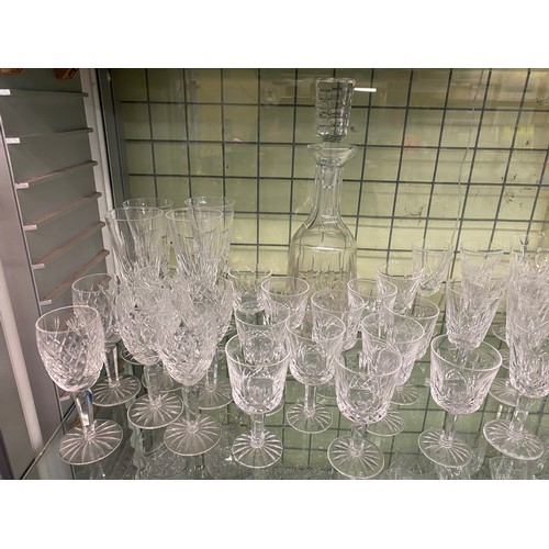 332 - SUITES OF WATERFORD CRYSTAL LISMORE PATTERN CUT GLASSWARE INC DECANTER, WINES, SHERRY AND FLUTES