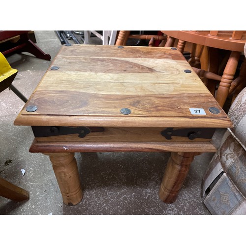 37 - MANGO WOOD LAMP TABLE WITH METAL STRAP WORK MOUNTS