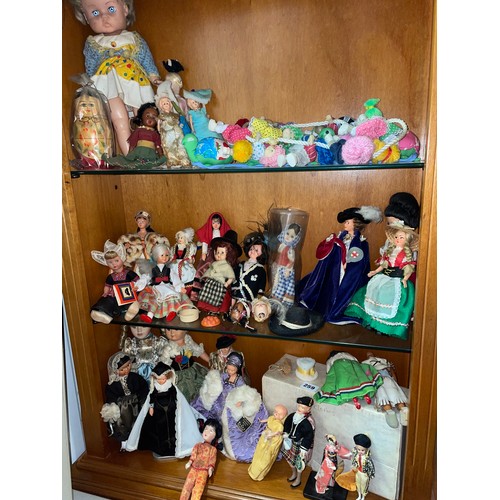 259 - SELECTION OF MINIATURE DRESS DOLLS AND DRESS DOLL UNIFORMS