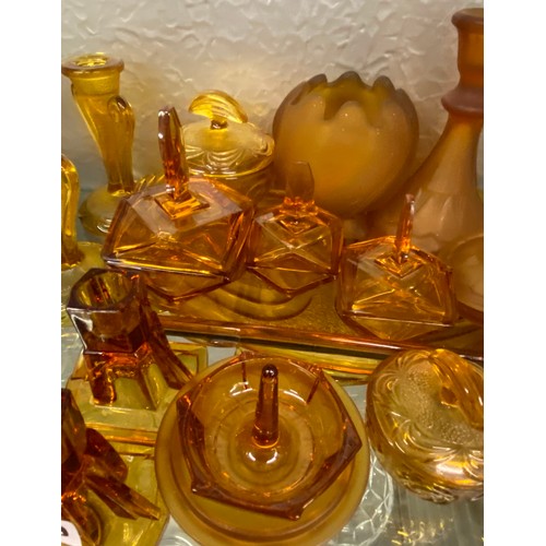 319 - PRESSED AMBER GLASS DRESSING TABLE SET AND SIMILAR PART SET