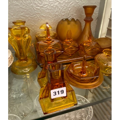 319 - PRESSED AMBER GLASS DRESSING TABLE SET AND SIMILAR PART SET