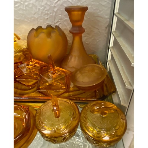 319 - PRESSED AMBER GLASS DRESSING TABLE SET AND SIMILAR PART SET