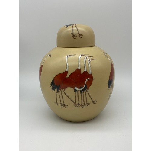 383 - CHINESE GLOBULAR JAR AND COVER DECORATED WITH CRANES AND ONE OTHER ORIENTAL JAR AND COVER