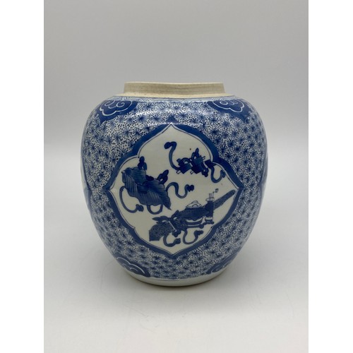 524 - CHINESE OVOID BLUE AND WHITE JAR DECORATED WITH PANELS PAINTED WITH LANDSCAPES AND ATTRIBUTES