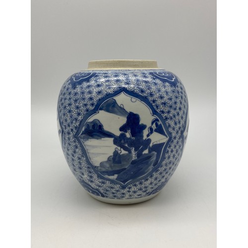 524 - CHINESE OVOID BLUE AND WHITE JAR DECORATED WITH PANELS PAINTED WITH LANDSCAPES AND ATTRIBUTES