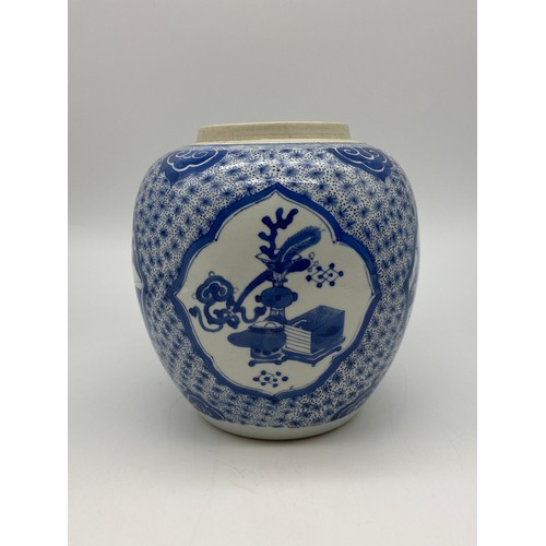 524 - CHINESE OVOID BLUE AND WHITE JAR DECORATED WITH PANELS PAINTED WITH LANDSCAPES AND ATTRIBUTES