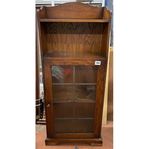 184 - OAK NARROW LEADED GLAZED DOOR BOOK SHELF CUPBOARD