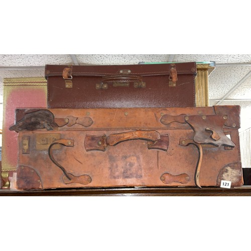 121 - TWO LEATHER VINTAGE TRAVEL TRUNKS