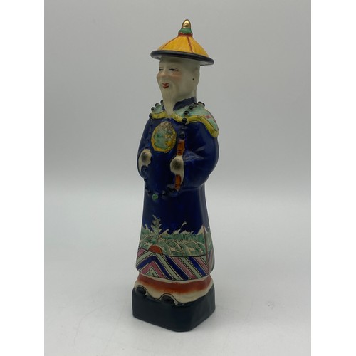 386 - THREE CHINESE BLUE AND WHITE AND DECORATIVE EMPEROR FIGURES