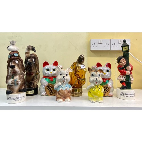 395 - NOVELTY POTTERY MONEY BANKS AND HORSE HEAD SPIRIT FLASK