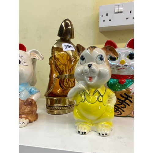 395 - NOVELTY POTTERY MONEY BANKS AND HORSE HEAD SPIRIT FLASK