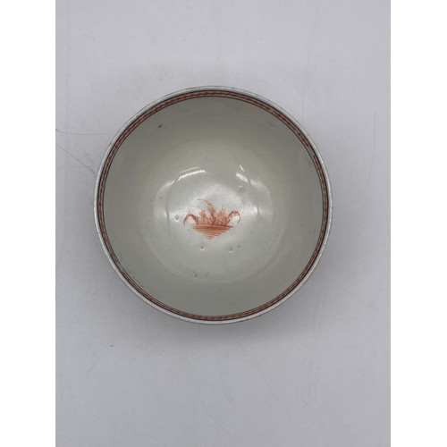 668 - TWO CHINESE RIBBED TEA BOWLS AND A CANTON FAMILLE ROSE MANDARIN TEABOWL AND SAUCER