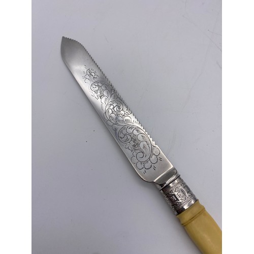 657 - CASED ELECTRO PLATED CAKE KNIFE