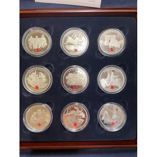 646 - BOXED TWO TRAY LEAST WE FORGET COIN COLLECTION NUMBER 429 OF £5 ENAMEL COINS