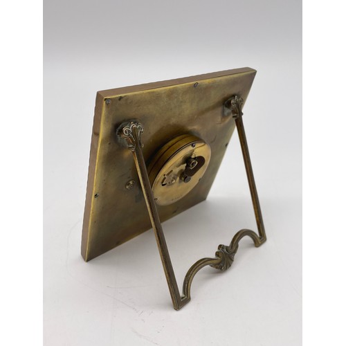 670 - EIGHT DAY EASEL BACKED TRAVELLING CLOCK