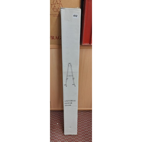 412 - BOXED UNIVERSAL GUITAR STAND