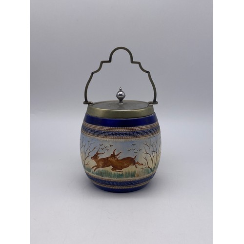 662 - ROYAL DOULTON INSPIRED BISCUIT BARREL WITH PAINTED DEER AND HORSE DECORATION