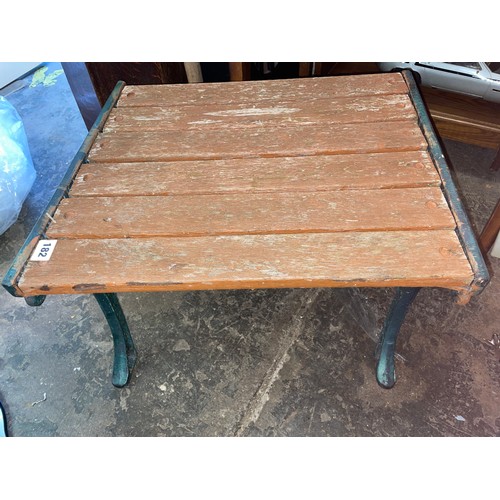 182 - SLATTED WROUGHT IRON ENDED GARDEN BENCH AND LOW TABLE