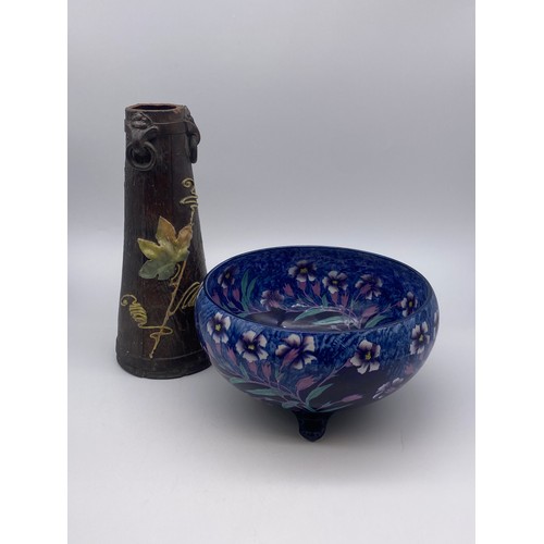 324 - BLUE FLORAL DECORATED BOWL ON RAISED FEET AND A BRETBY POTTERY ART NOUVEAU BARK VASE WITH INSECT DEC... 