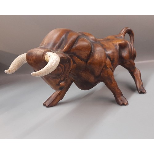 399 - POTTERY CRACKLE GLAZED BULL AND MATADOR FIGURE