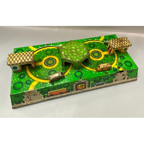 689 - TIN PLATE DOUBLE ROUNDABOUT MECHANICAL TOY