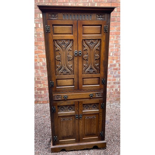 136 - OLD CHARM OAK LINEN FOLD CARVED UPRIGHT DRINKS CABINET