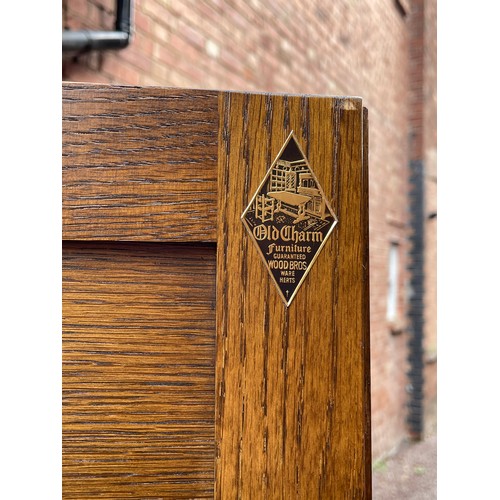 136 - OLD CHARM OAK LINEN FOLD CARVED UPRIGHT DRINKS CABINET