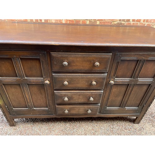 148 - ERCOL PANEL DOOR DRESSER BASE