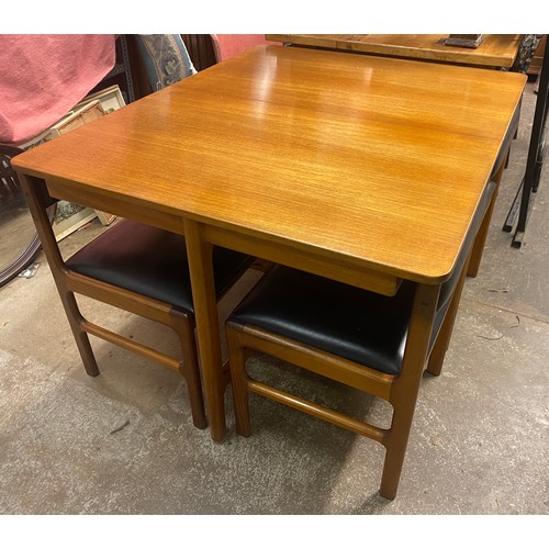 28 - MCINTOSH TEAK SQUARE DINING TABLE AND FOUR CHAIRS #9943