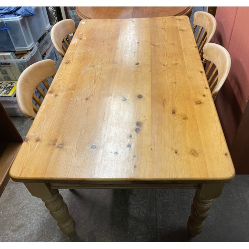 83 - PINE VICTORIAN STYLE FARMHOUSE TABLE AND FOUR SLAT BACK CHAIRS