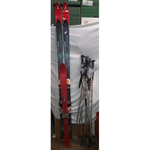 13 - PAIRS OF SKIS AND POLES