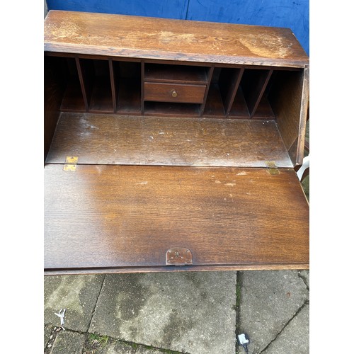 153 - QUALITY OAK LINEN FOLD CARVED BUREAU