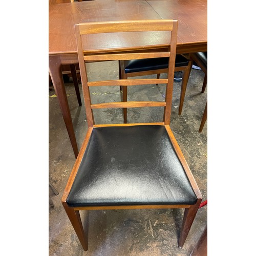 162 - 1960S TEAK DINING TABLE AND THREE LADDER BACK CHAIRS