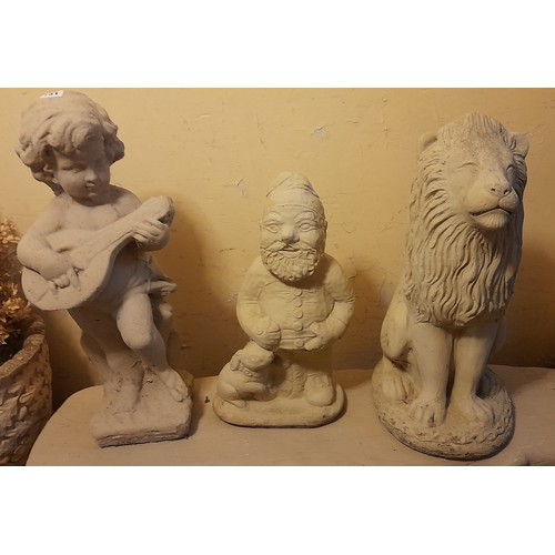 173 - YELLOW STONEWORK CHERUB FIGURE, GNOME, AND SEATED LION