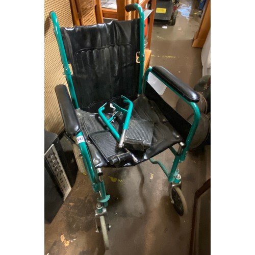 175 - FOLDING WHEEL CHAIR WITH FOOT RESTS