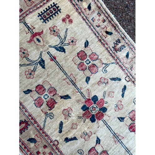 41 - 20TH CENTURY CREAM GROUND FLORAL PATTERN CARPET