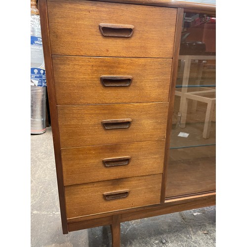 193 - 1970S TURNIDGE TEAK NARROW BOOK CASE WITH SLIDING GLASS DOORS