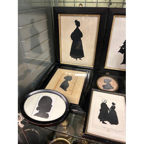 379 - SHELF OF 19TH CENTURY AND LATER SILHOUETTES FRAMED AND GLAZED